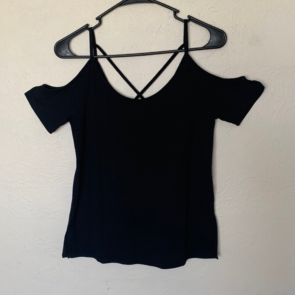Black top with cut out shoulders.